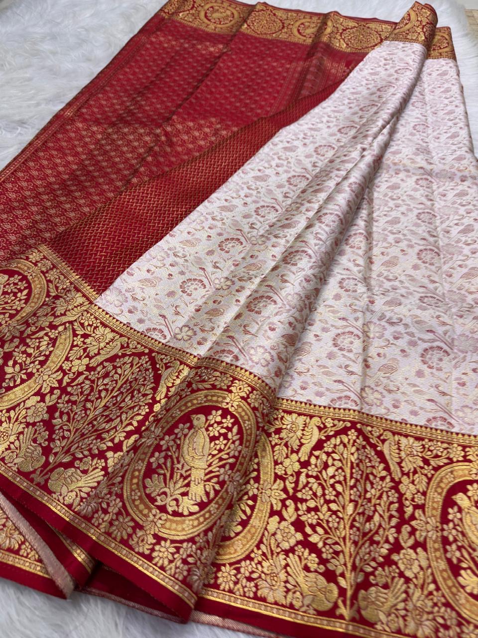 Arakku Red gold zari border with bird medallions and flowering trees on Pearl Ivory Kanchipuram silk.