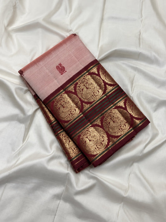 Arakku circular motif border on a pearl pink Rettapet Kanchipuram silk saree