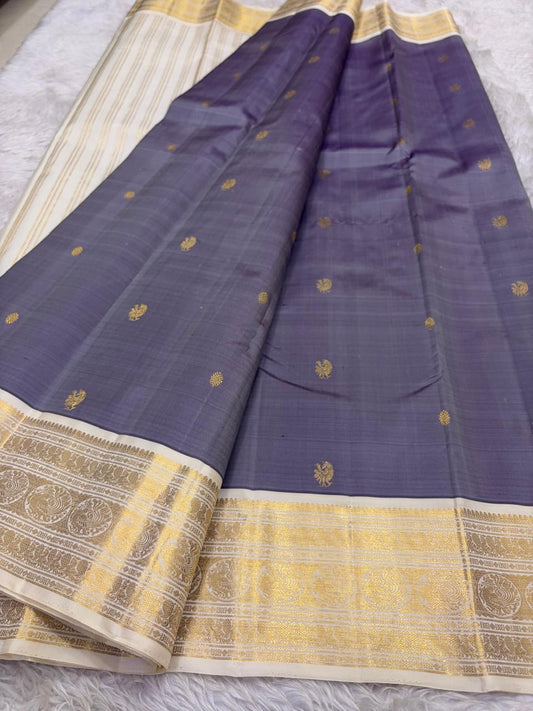 Periwinkle korvai Kanjivaram silk saree with muted antique gold zari and heritage ivory border