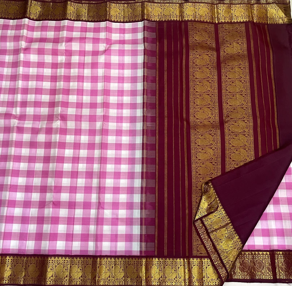 Deep Raspberry Pink pallu with beautiful traditional gold motifs