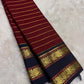 Pillar box red Kanchi Pattu saree with Veldhari stripes and Rettapet border