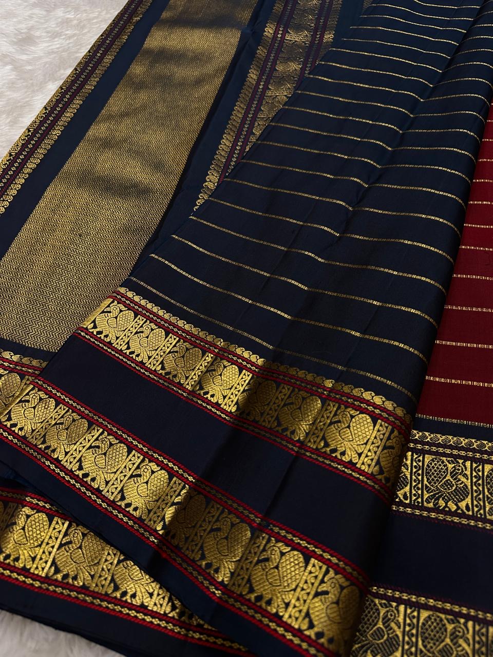 Pillar box red Kanchi Pattu Rettapet saree, close drape view