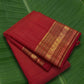 Closeup red Kanchipuram saree varisaipet border and gold zari butta pallu detail Idam Living