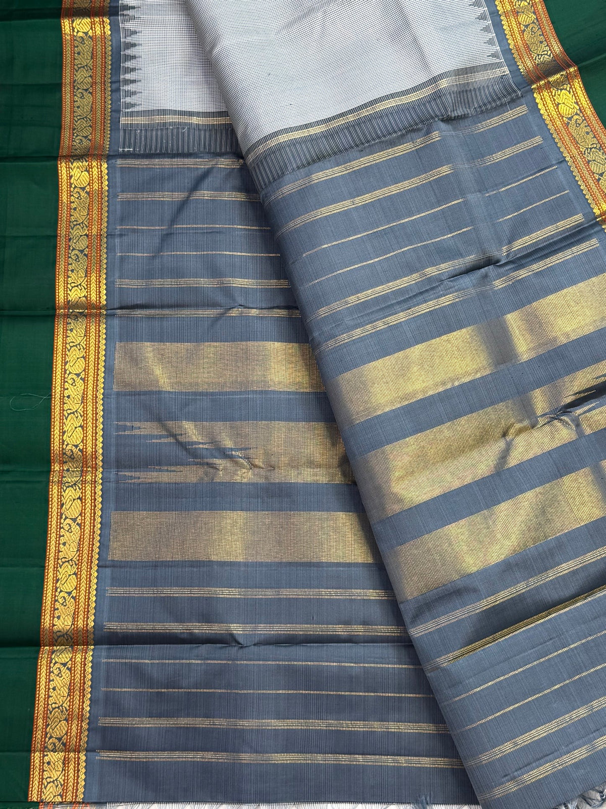 Pillayar Reku grey and bottle green Kanchipuram silk saree border