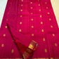 Handwoven Raspberry Pink Butta saree with traditional antique-gold zari border.
