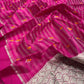 Close-up of small orange-and-ivory woven motifs on the Raspberry Pink striped Pattu Silk Chanderi saree.