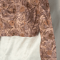 Floral patterned blouse with gold embroidery on a white background, featuring the brand 'IDAM'.