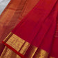 Close view of antique-gold checked zari grid on Chilli Reddish Pink Kanjivaram silk.