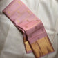 Dusty Rose Pink Kanjeevaram saree close-up showing pink and gold Gandaberunda butta zari motifs
