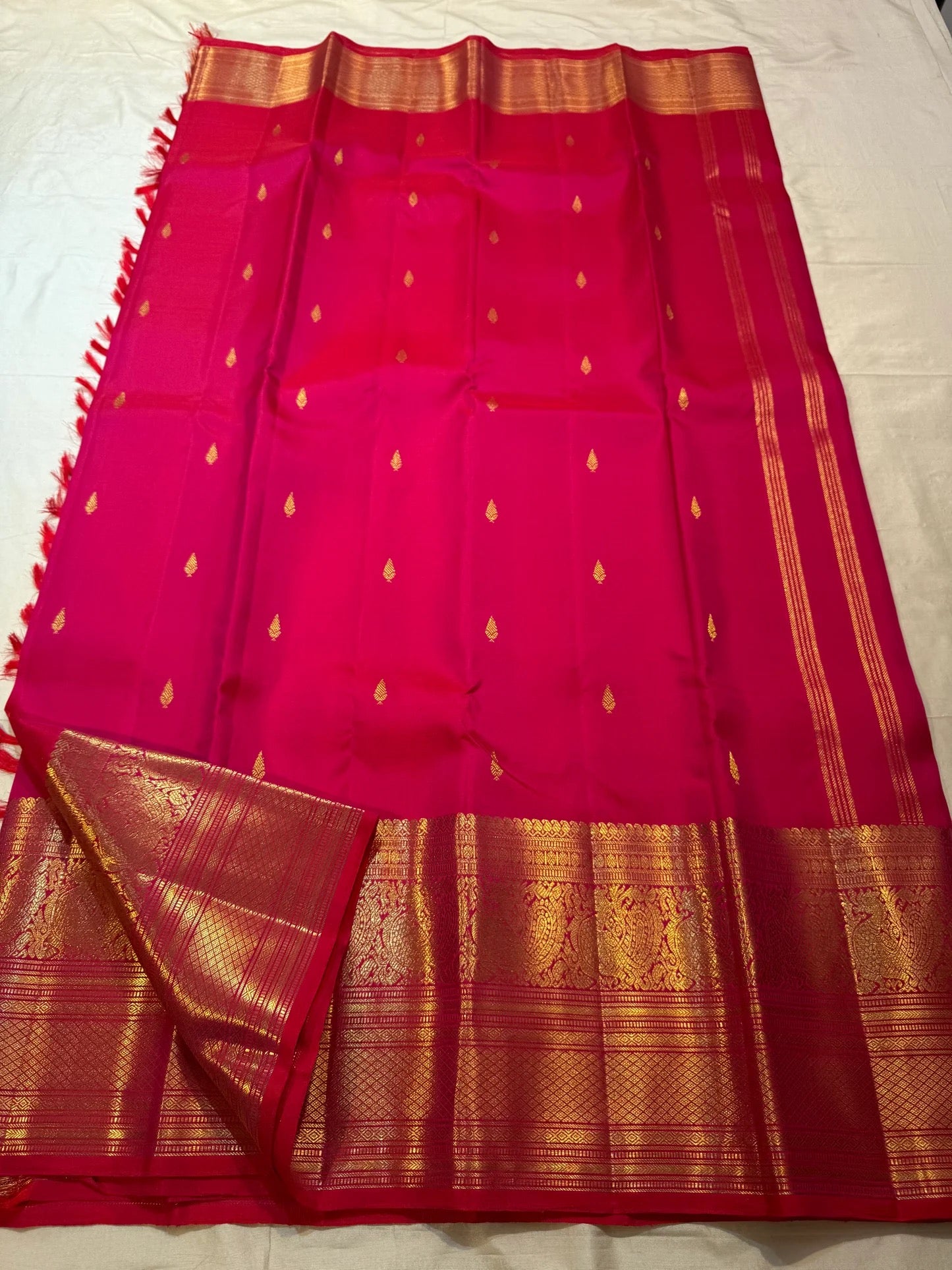 Raspberry Pink pure silk Kanjipuram saree — gold zari detail