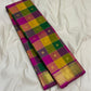 Long-folded Pure Kanchipuram silk saree showing multicolor checked body and zari woven gold border on white fabric.