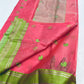 Pink and green handloom Katan Silk Chanderi saree draped to show body and border