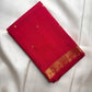 Close view of Sindoor Red pure silk meeting a broad traditional classic-gold zari border.