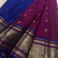 Pink Kanjeevaram silk saree with traditional gold zari close-up
