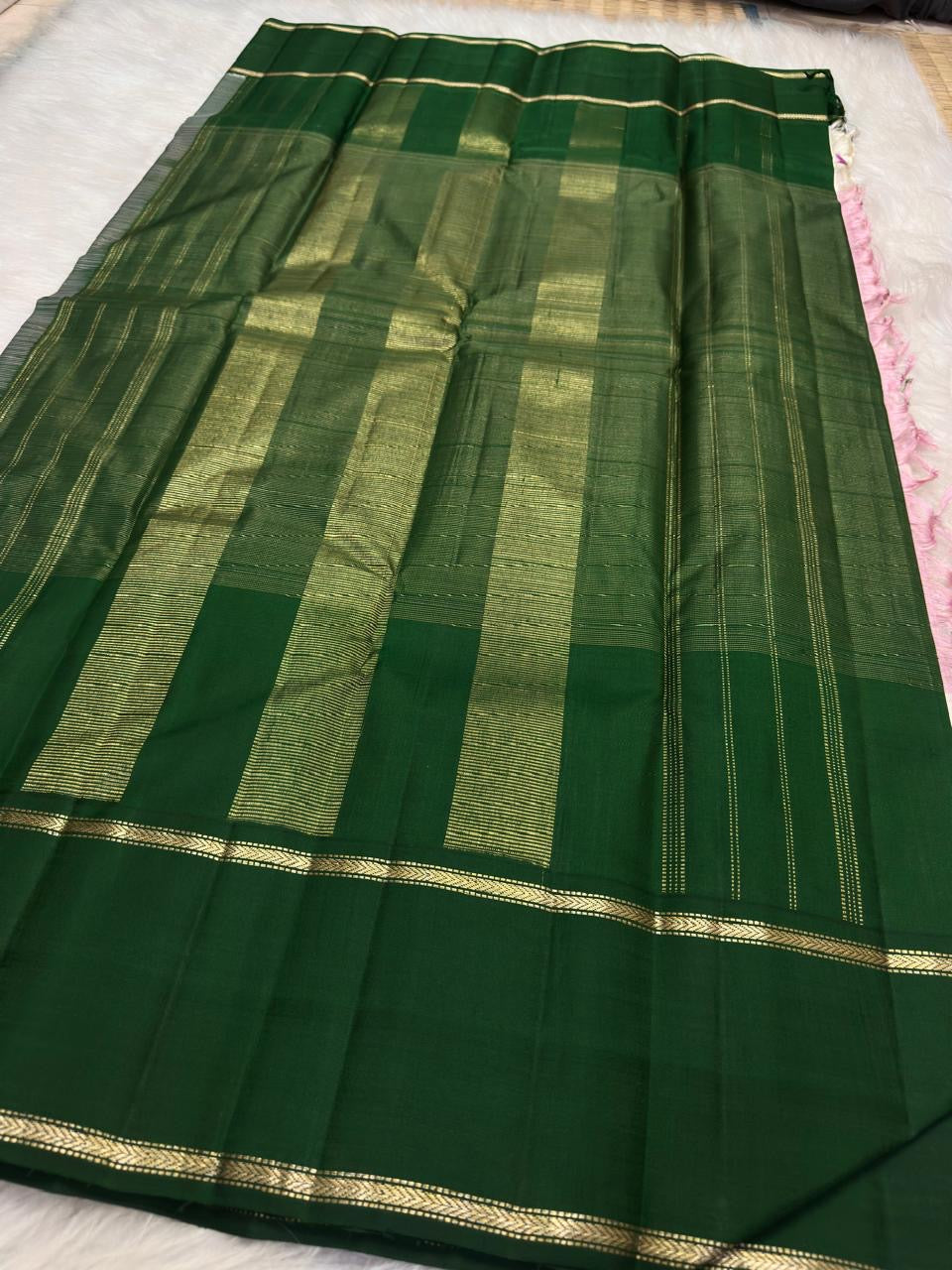 Layered Korvai colour transition from lotus pink through ivory to green