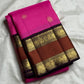 Traditional Kanjivaram saree in jewel pink silk with antique gold zari and woven peacock motifs