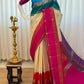 Pallu detail in hot pink with zari woven patterning and a blue-purple contrast end panel.