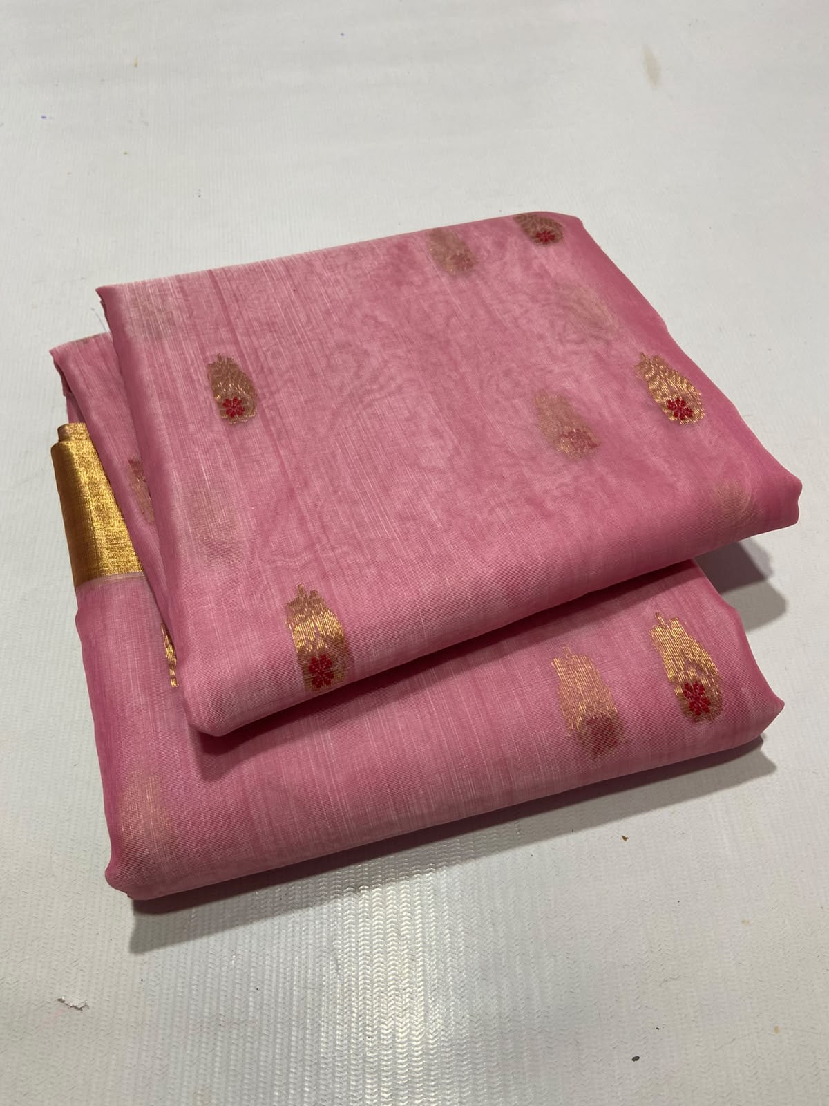 Pink Tissue Pattu Silk Chanderi saree draped to show body and border