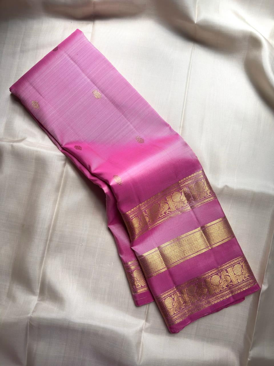 Handwoven Rose Orchid Pink Pure Silk Kanchipuram saree with petite gold zari buttas.