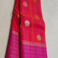 pink red kanchipuram silk saree folded showing antique gold butta and zari border
