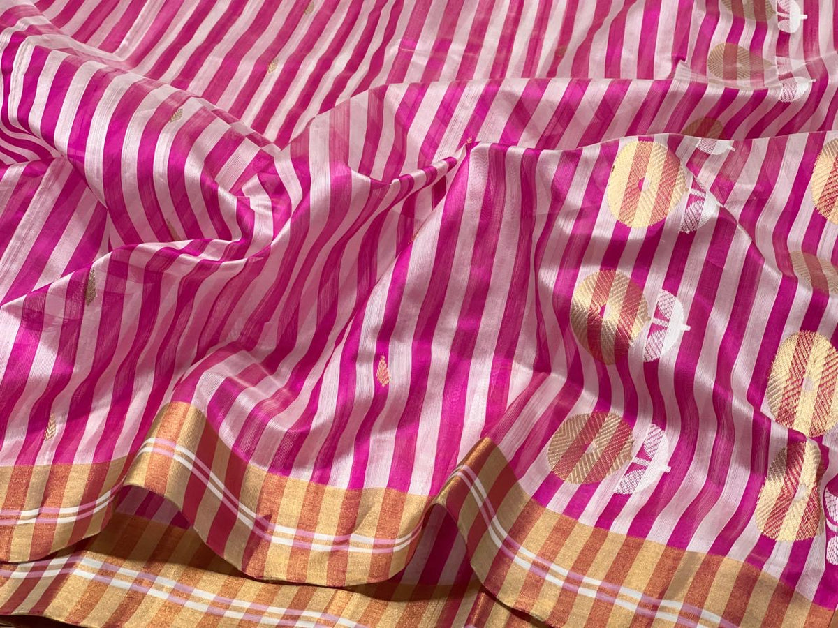Pallu of fuchsia pink striped Pattu Silk Chanderi saree