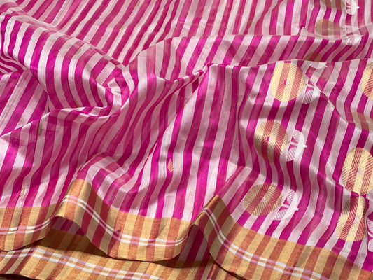 Pallu of fuchsia pink striped Pattu Silk Chanderi saree
