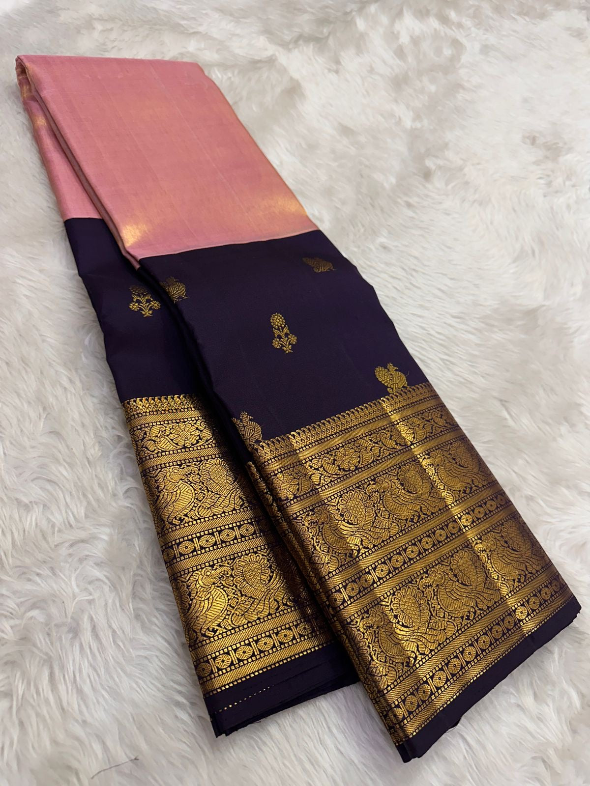 Close-up of Gandaberunda zari motif on pink tissue silk KanchiPattu Korvai saree