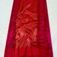 Close-up of the Muniya-style painted border on a Rani Pink Tissue Silk Chanderi saree
