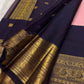 Pink tissue silk KanchiPattu Korvai saree, temple-style zari border detail