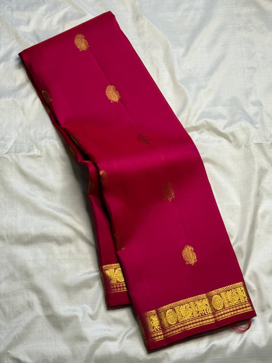 Raspberry Pink pure mulberry silk saree with dense antique-gold traditional pallu.