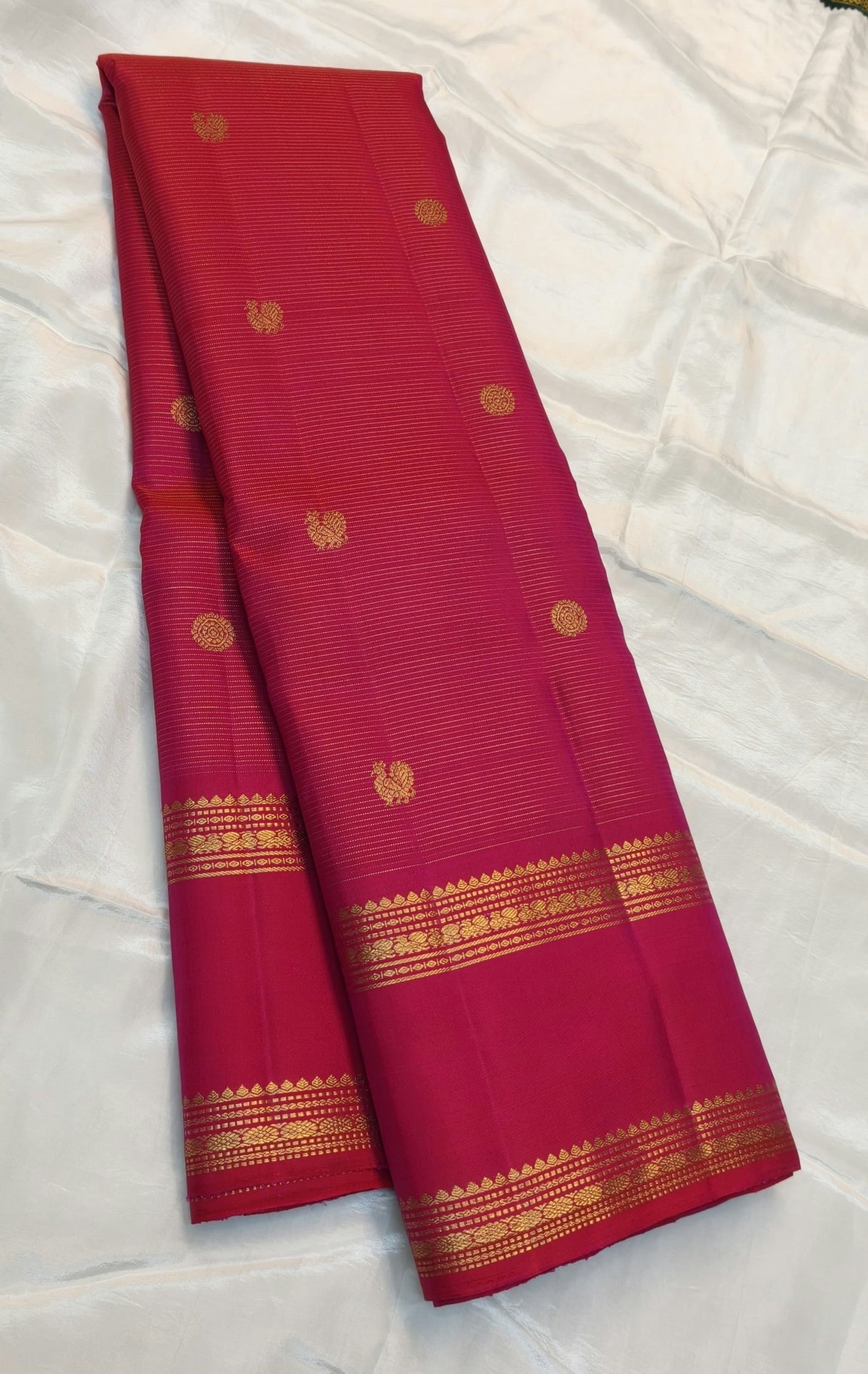 Raspberry Pink Vairaoosi saree with handwoven antique gold zari buttas