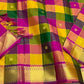 Close-up of multicolor checked Kanchipuram silk saree with zari woven gold border and magenta pallu weave.