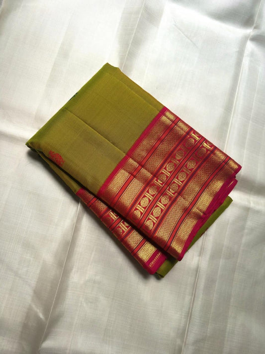 Manjal Pachai green Kanchipuram pure silk saree with pinkish red shot varisaipet border