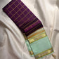 Handwoven Pista Green Kanchipuram silk saree with all-over antique gold zari checks