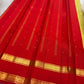 Kancheepuram pure silk rettapet border saree in golden radiant green with gopuram reku and buttas