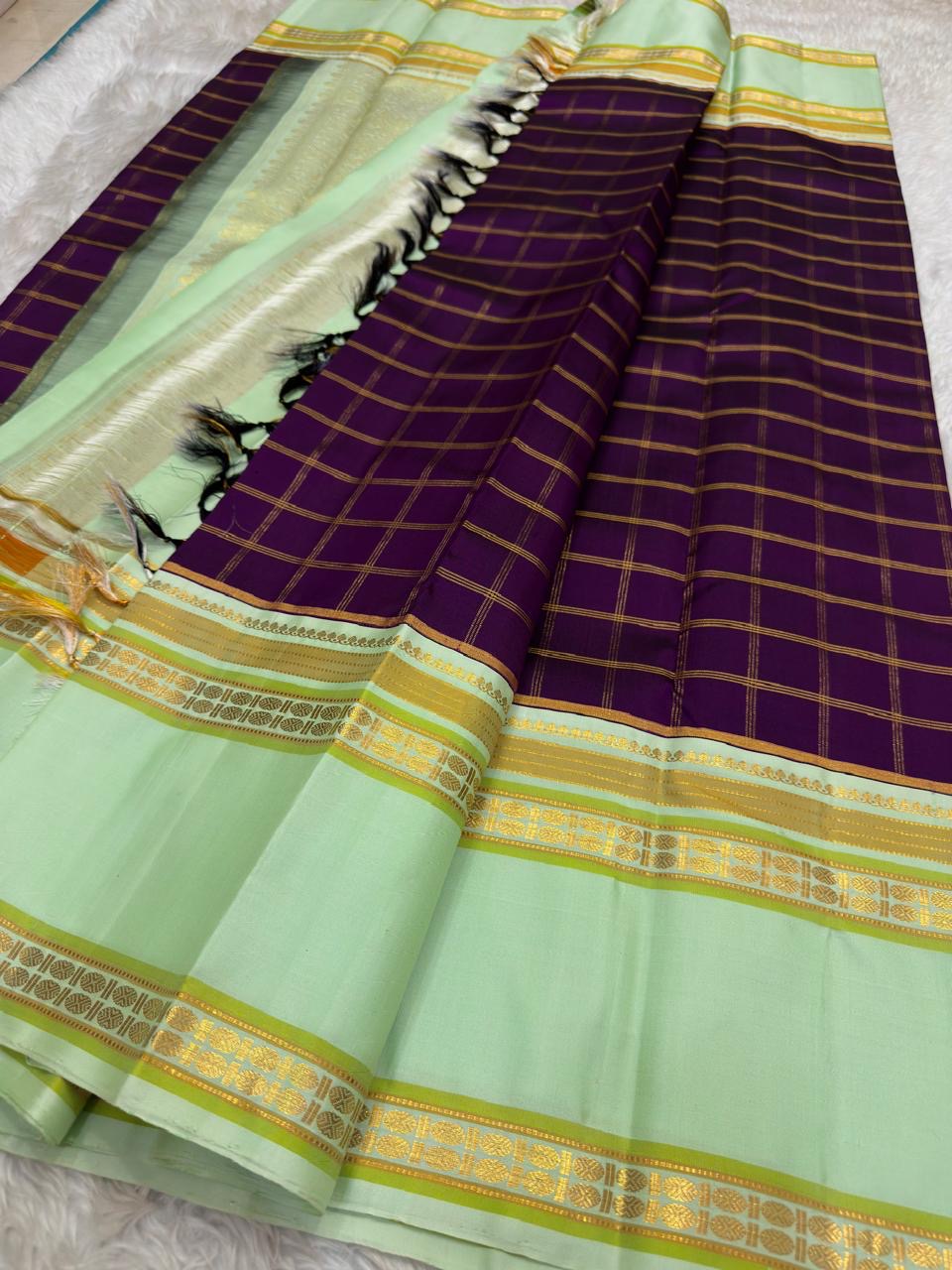 Pista Green Kanjivaram saree with fine geometric gold zari check weave