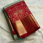 Close-up of the red zari border on the Pista green Kanjivaram silk saree