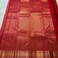 Pista green Kanjivaram silk saree with directional zari texture