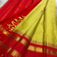 Golden radiant green pure silk Kanchipuram korvai saree with vermilion red rettapet border