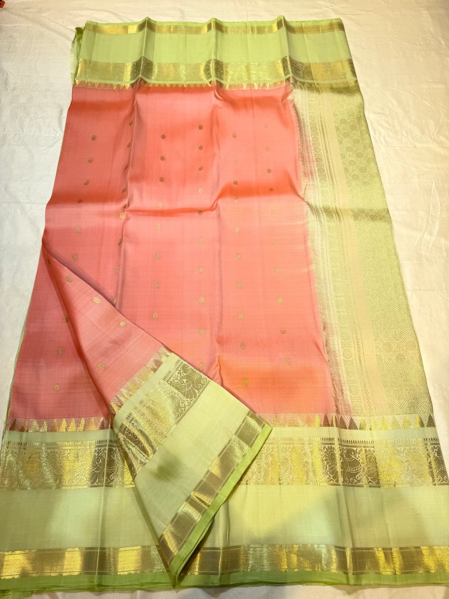 Parrot green korvai border with vanasringaram gold zari pallu panels on golden peach saree — Idam Living