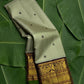 Pistachio green and deep purple korvai Kanchi Pattu silk saree with mayil chakram butta and Kanchana border — Idam Living