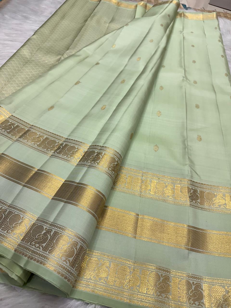 Pale Pistachio-Mint Handwoven Pure Silk Kanchipuram Saree with Gold Zari Buttas and Varisaipet Border