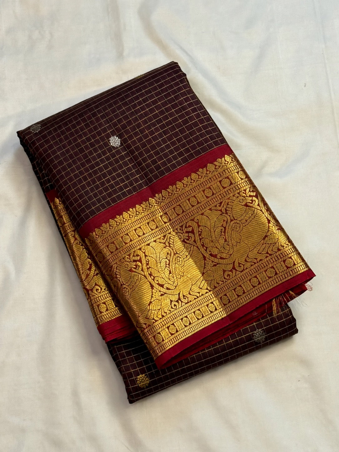 Plum-brown Kanchipuram pure silk with luminous gold zari checks