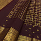 Handwoven plum-brown Kanjivaram silk with petite zari buttas and antique-gold Mayil Pettu border