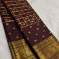 Deep plum-brown Lightweight Kanchipuram silk saree with gold zari kattam and ornate Mayil border