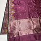 Plum Chanderi saree showing bird and foliage woven border