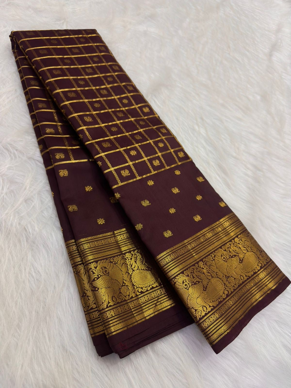 Plum-Tinged Espresso Brown Kanchipuram silk with zari kattam, floral buttas and broad gold border