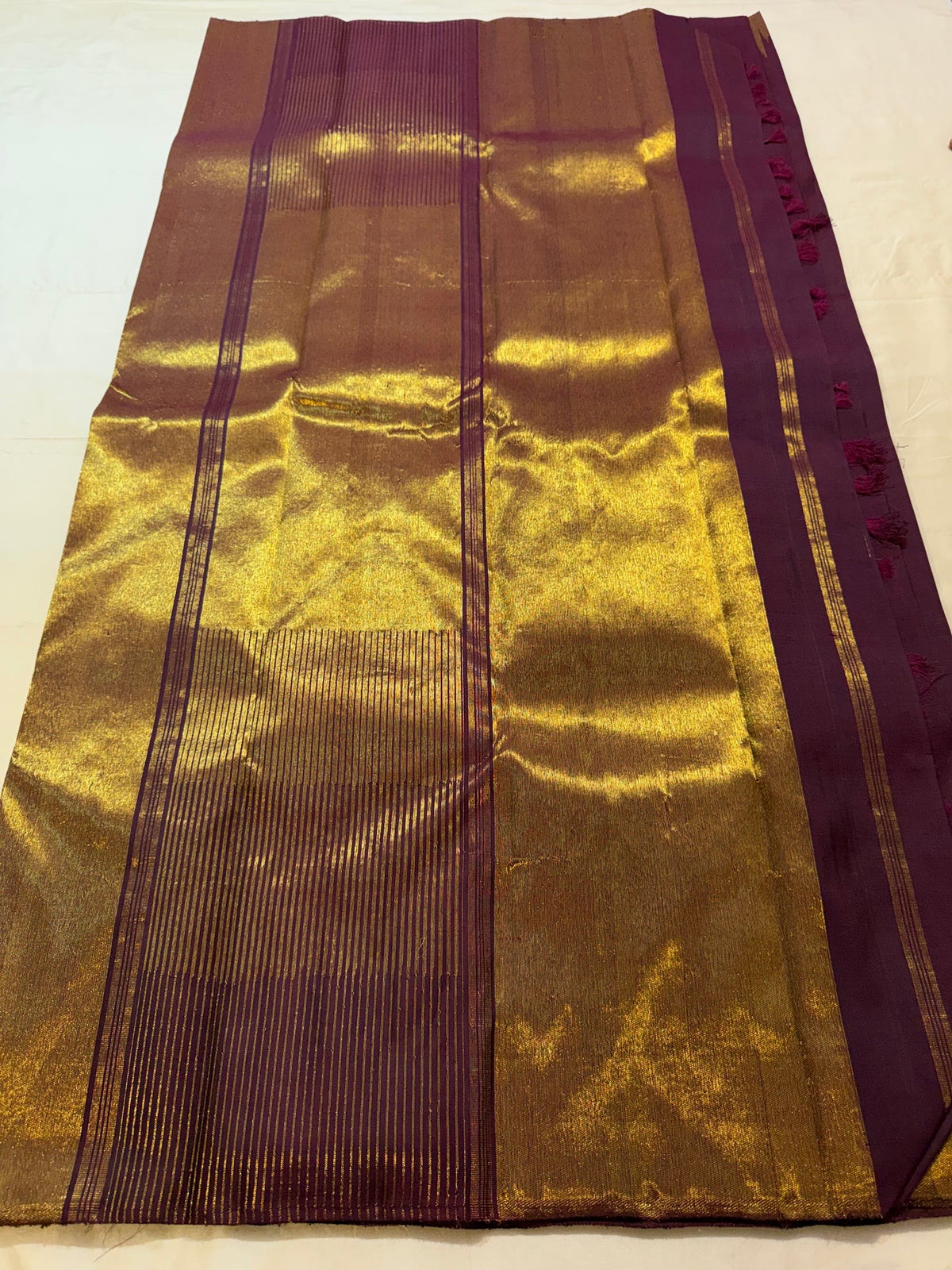 Plum temple border Kanjivaram silk saree pallu