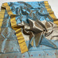 Powder blue Chanderi saree with red floral buttas