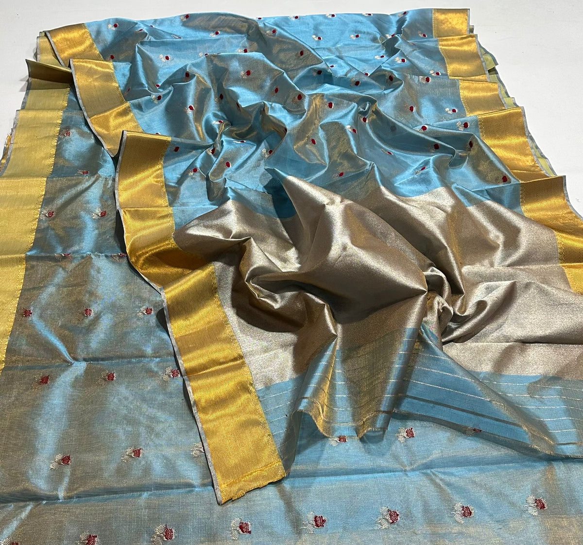 Powder blue Chanderi saree with red floral buttas